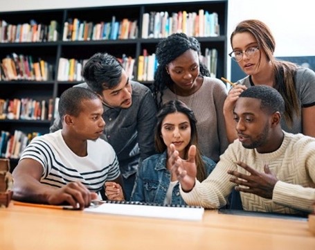 image of people talking around table