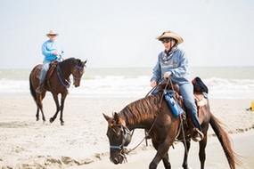 2 Riders on the beach